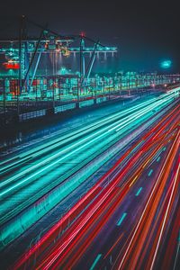 High angle view of light trails on city at night