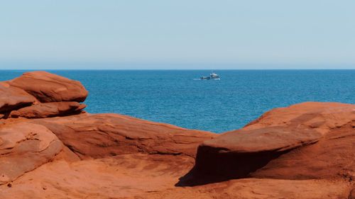 Scenic view of sea against clear sky