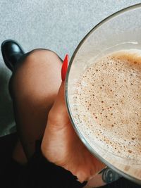 Close-up of hand holding coffee