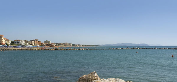 Scenic view of sea against clear sky