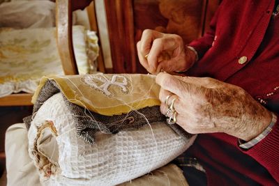 Close-up of woman hand working at home