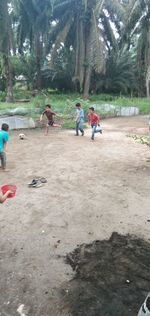 Group of people playing on the ground