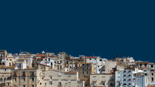 Townscape against blue sky