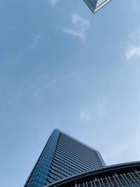 Low angle view of modern building against sky