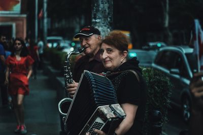 Young couple standing outdoors
