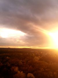 Scenic view of landscape against cloudy sky