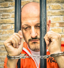 Close-up of criminal in prison