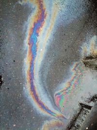 Close-up of rainbow over road