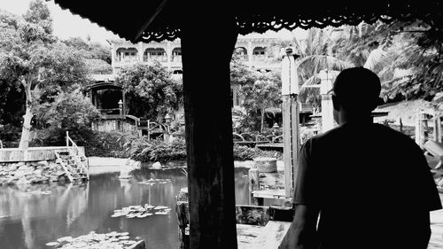 Woman standing against wall