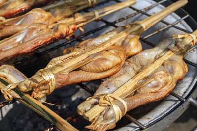 Close-up of meat on barbecue