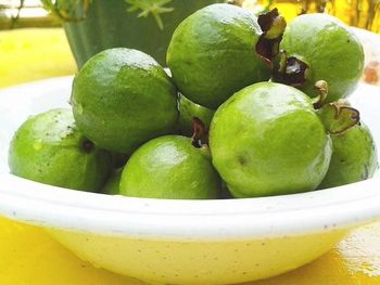 Close-up of fruits on wooden table