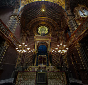 Low angle view of illuminated ceiling of building