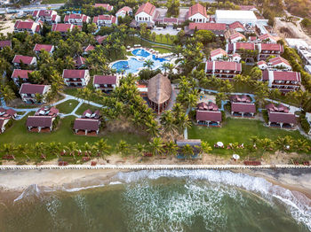 High angle view of swimming pool by buildings in town