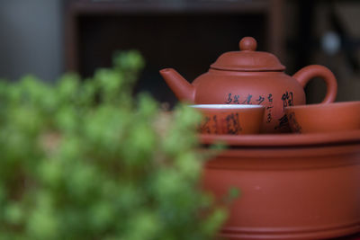 Selective focus of tea pot and copy space