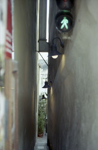 Alley amidst walkway in city
