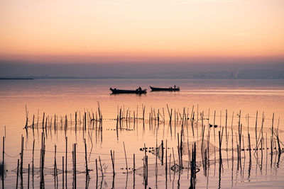 Scenic view of sea against sky during sunset