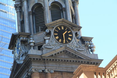 Low angle view of clock