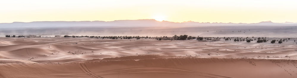 Panoramic view of landscape against sky during sunset