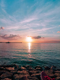 Scenic view of sea against sky during sunset