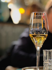 Close-up of wineglass on table