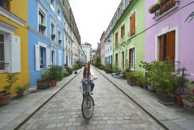 Woman riding a bicycle on street