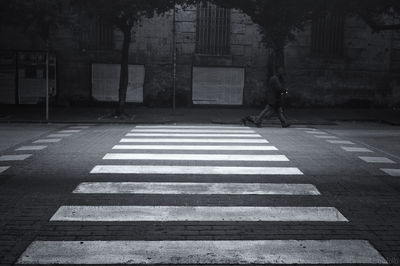 Zebra crossing on road in city