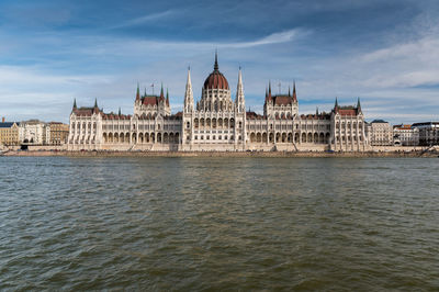 View of river with buildings in background