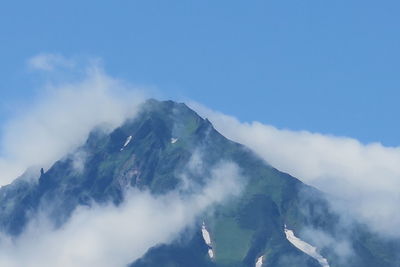 Low angle view of mountains against sky