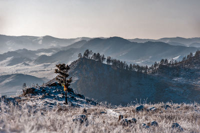 Scenic view of snowcapped mountains against sky