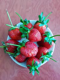 High angle view of strawberries on table