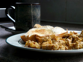 Close-up of breakfast served on table