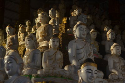 Buddha statue against building