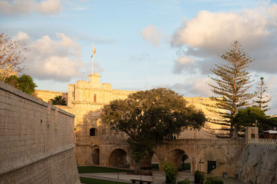 View of historic building against cloudy sky