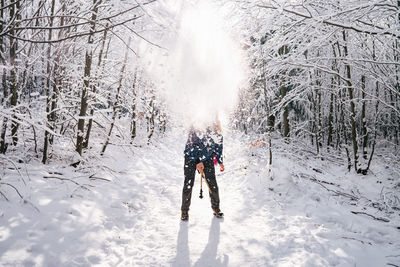 People walking on snow covered land