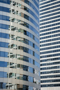 Low angle view of modern buildings in city