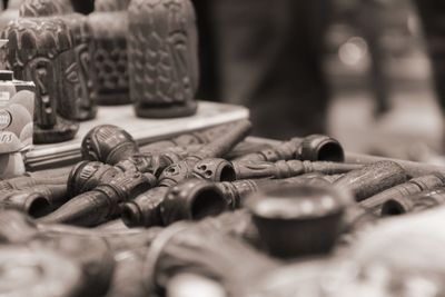 Close-up of smoking pipes at store