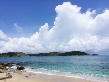 Scenic view of beach against sky