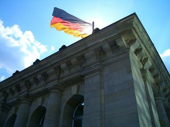 Low angle view of built structure against blue sky