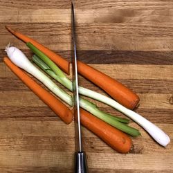 High angle view of vegetables on cutting board