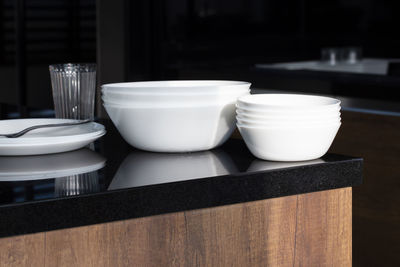 Close-up of ceramic containers on table