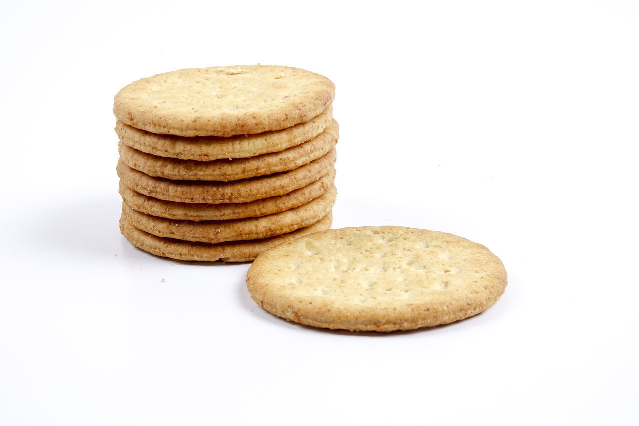 CLOSE-UP OF COOKIES ON WHITE BACKGROUND