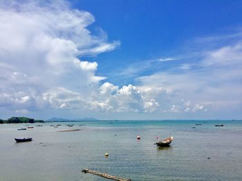 Scenic view of blue sea against sky