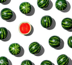 Directly above shot of fruits against white background