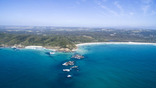 High angle view of boats sailing in sea against sky