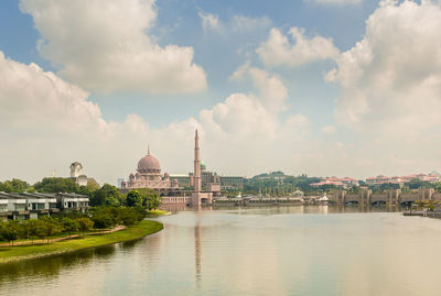 Panoramic view of buildings in city against sky