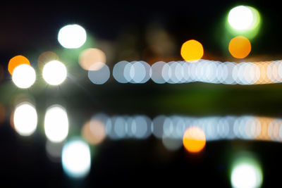 Defocused image of illuminated lights at night