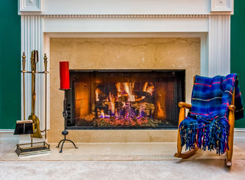 Chairs on floor against wall in building