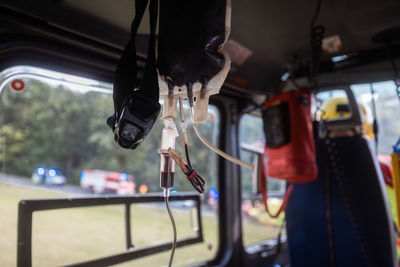 Transfusion bag with blood on board helicopter of air ambulance during flight. 