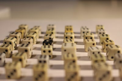 Close-up of dices arranged on table