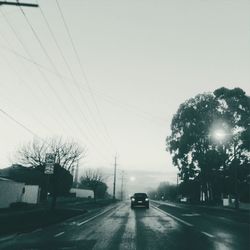 Road passing through trees